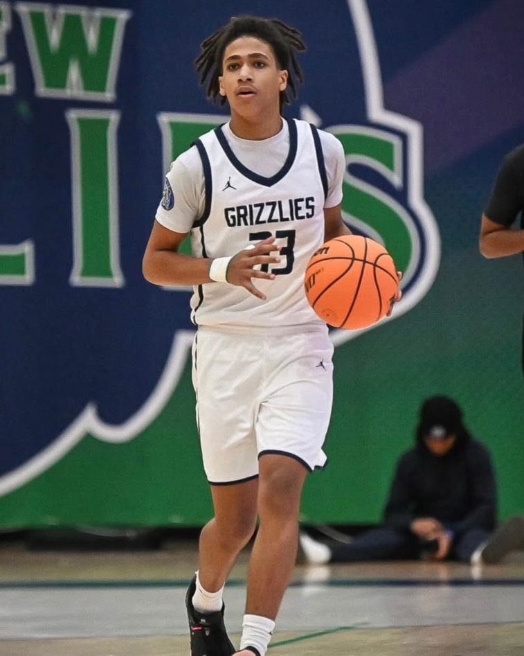 Alton (AJ) Snapp dribbling the basketball