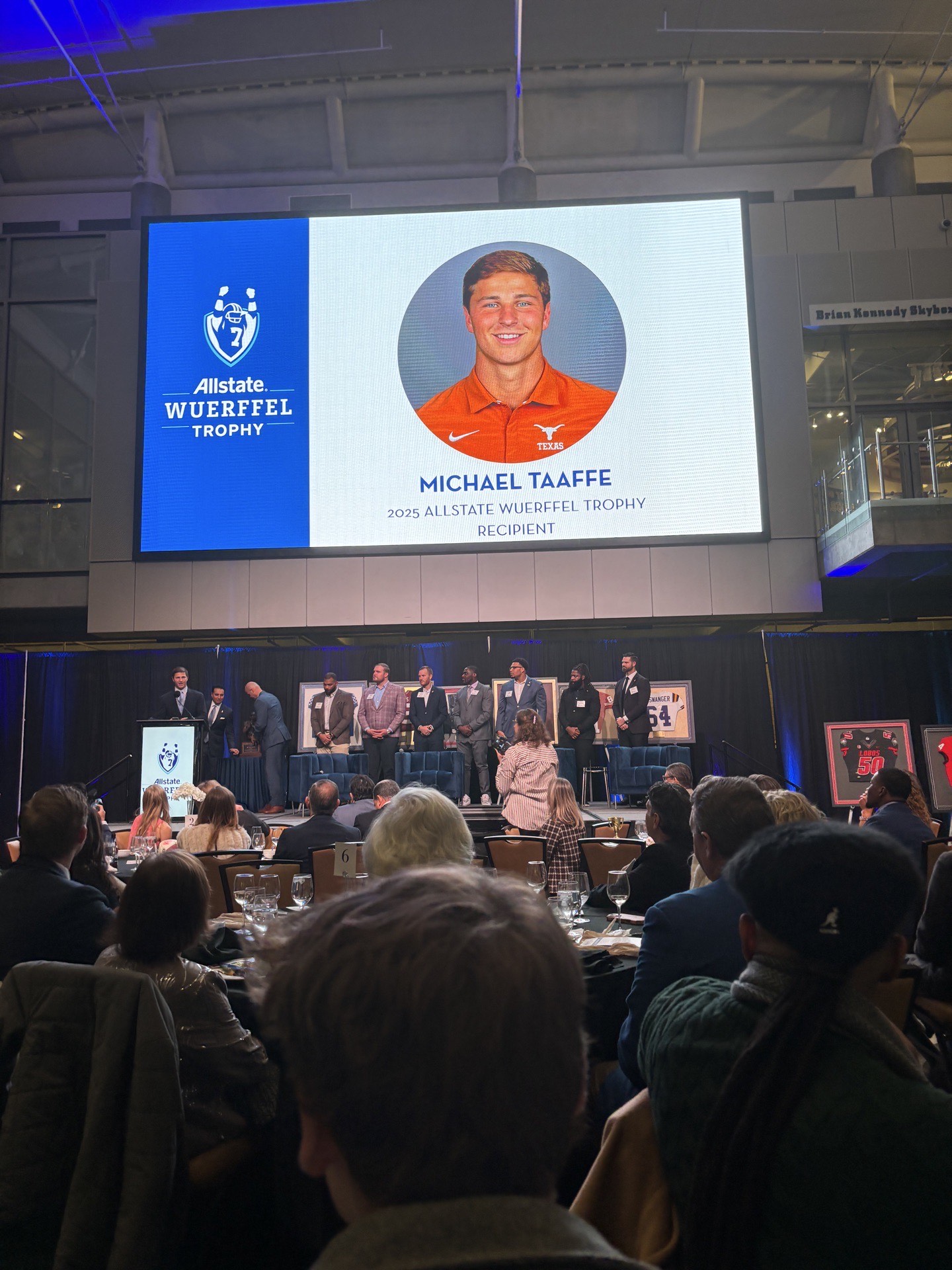 Michael Taaffe being honored on stage as the 2025 Wuerffel Trophy recipient